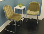 Pair of Chrome Cantelevered Chairs with Green Cushions